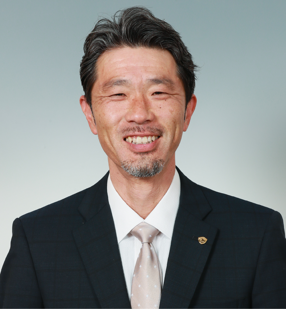 強化育成本部長 丹治 祥庸の写真を紹介